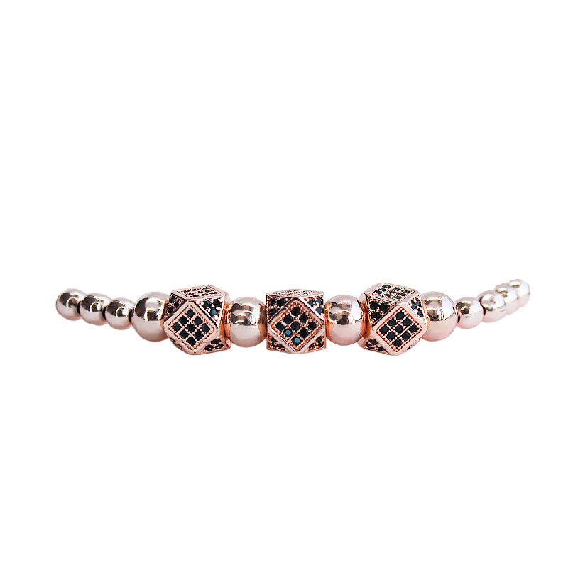 Pulsera de Rodio con dijes de dados y Zirconia Rosa